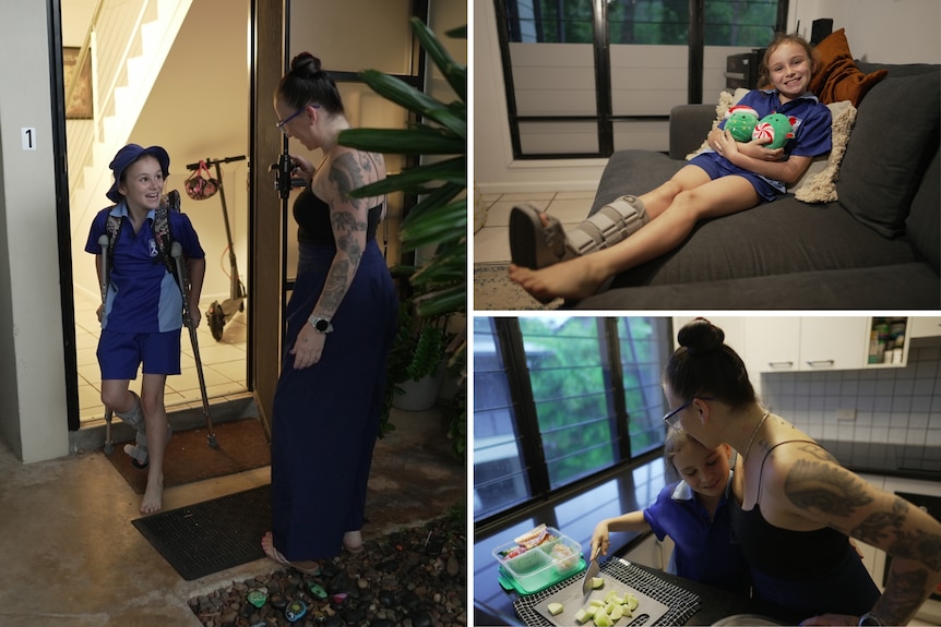 A mum helping her daughter, who is wearing a moon boot and using crutches, get ready for school.