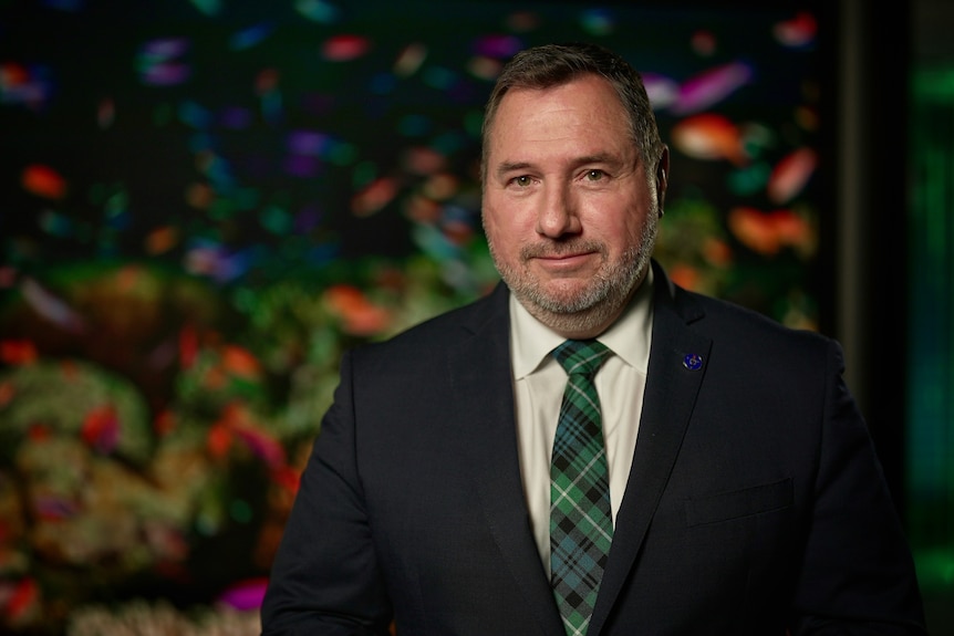 A man in a suit and tie.