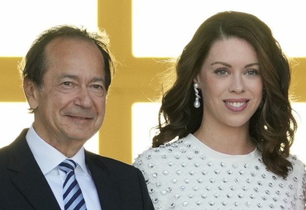 John Paulson and Alina de Almeida at a GOP fundraiser on Saturday, April 6, 2024, in Palm Beach, Fla. (AP Photo/Lynne Sladky)
