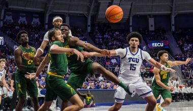 Baylor guard Cameron Carr (43), Baylor center James Nnaji (50), and TCU forward David Punch (15) look to rebound the ball during an NCAA college basketball game, Saturday, Jan. 3, 2026, Fort Worth, Texas. (AP Photo/Jessica Tobias)