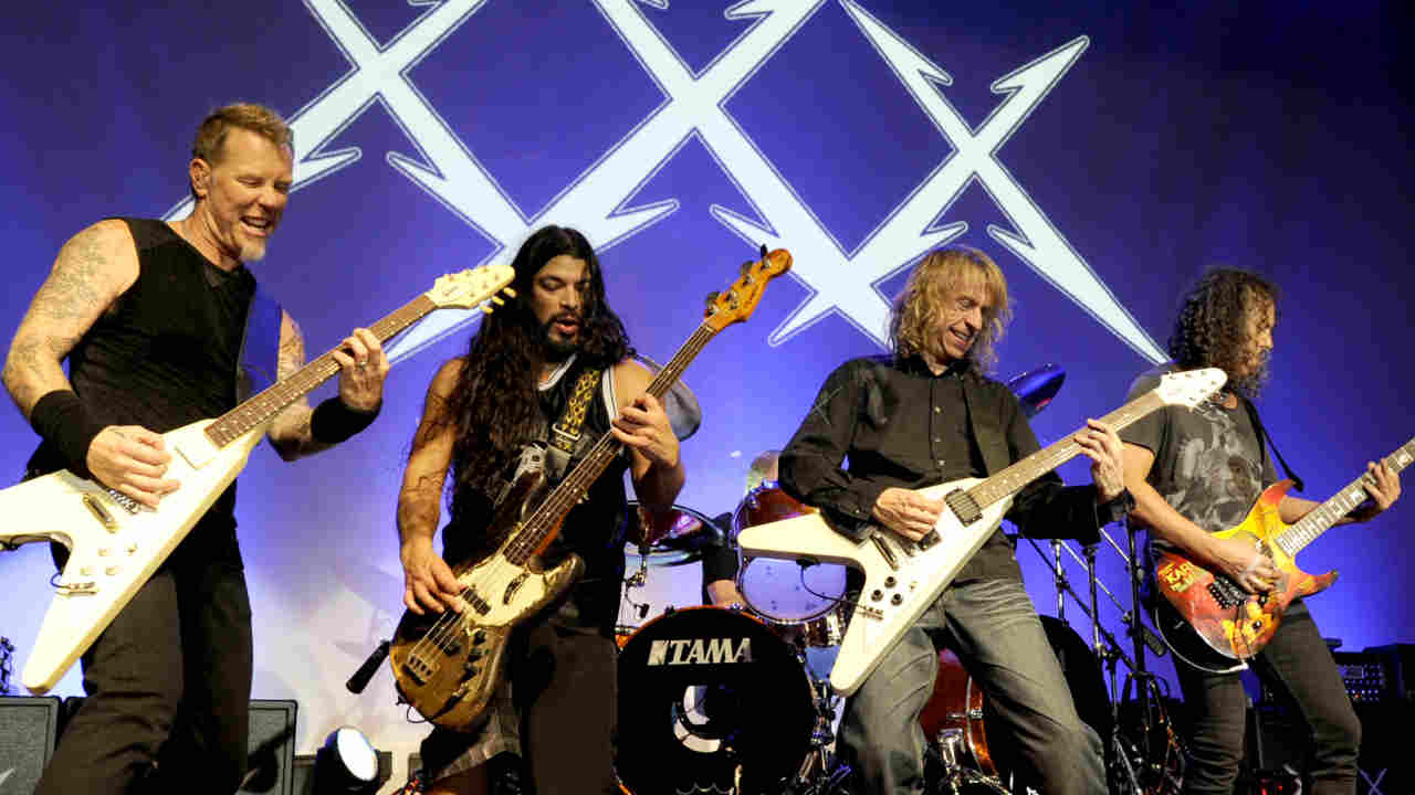 Diamond Head&rsquo;s Brian Tatler performing onstage with Metallica in 2011