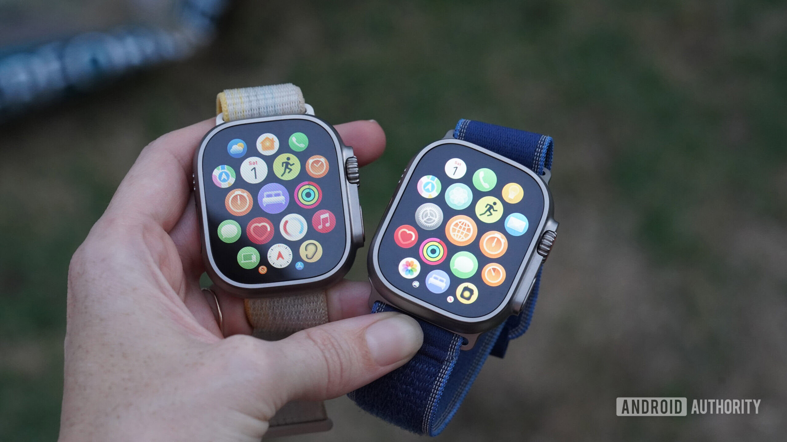Apple Watch Ultra comparison A use holds and Apple Watch Ultra 2 and Ultra 3 side by side.