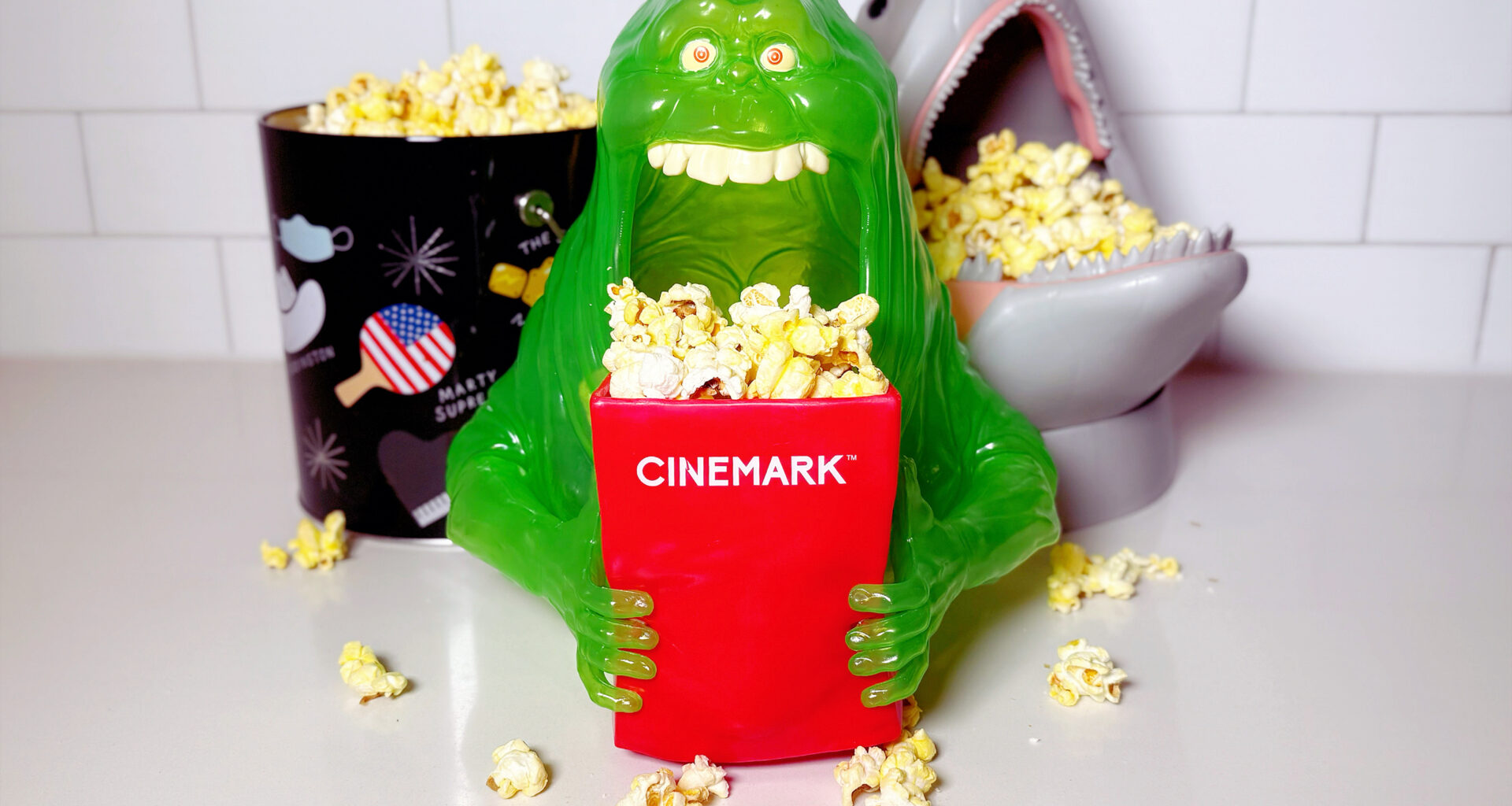 popcorn buckets filled with movie popcorn