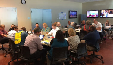 UNF's Incident Management Team sitting around two tables