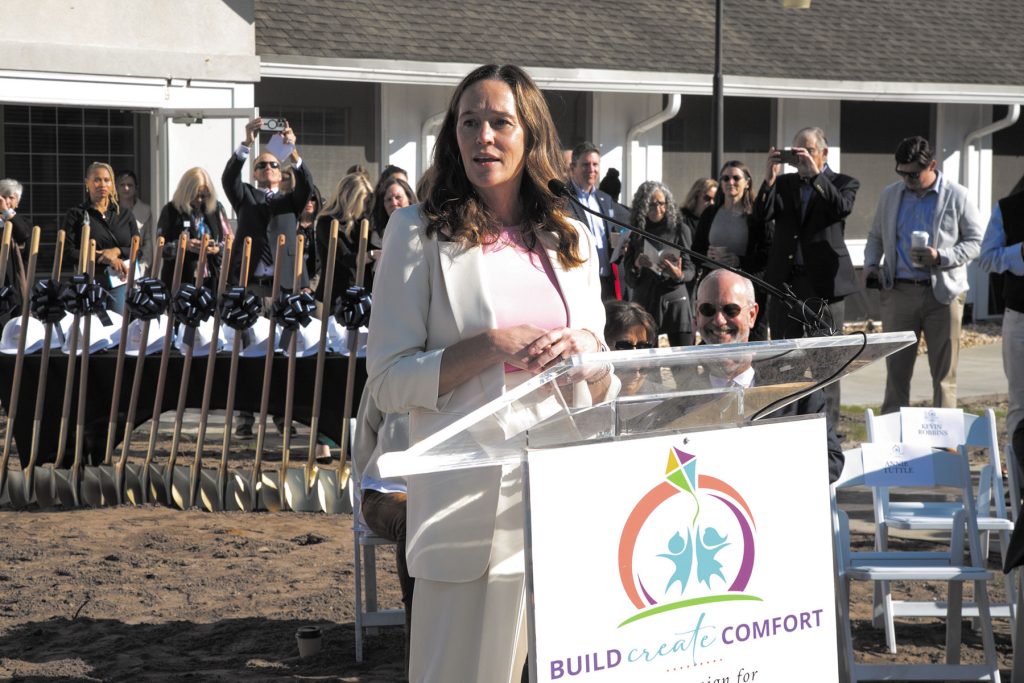 Annie Tuttle giving a welcoming speech at the Dorion Family Pediatric Center groundbreaking ceremony