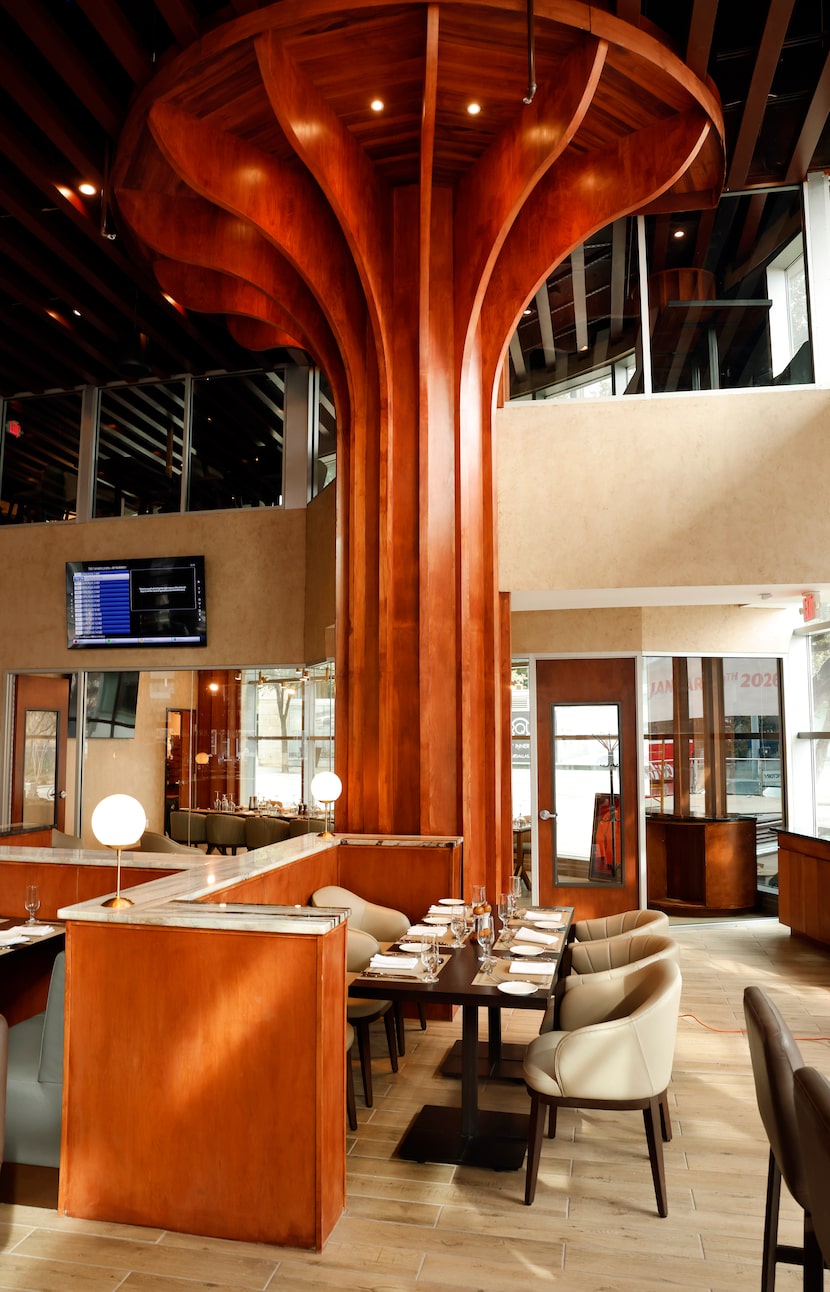 Designers added wooden "trees" inside Urban Italia in Dallas to give texture to the high...