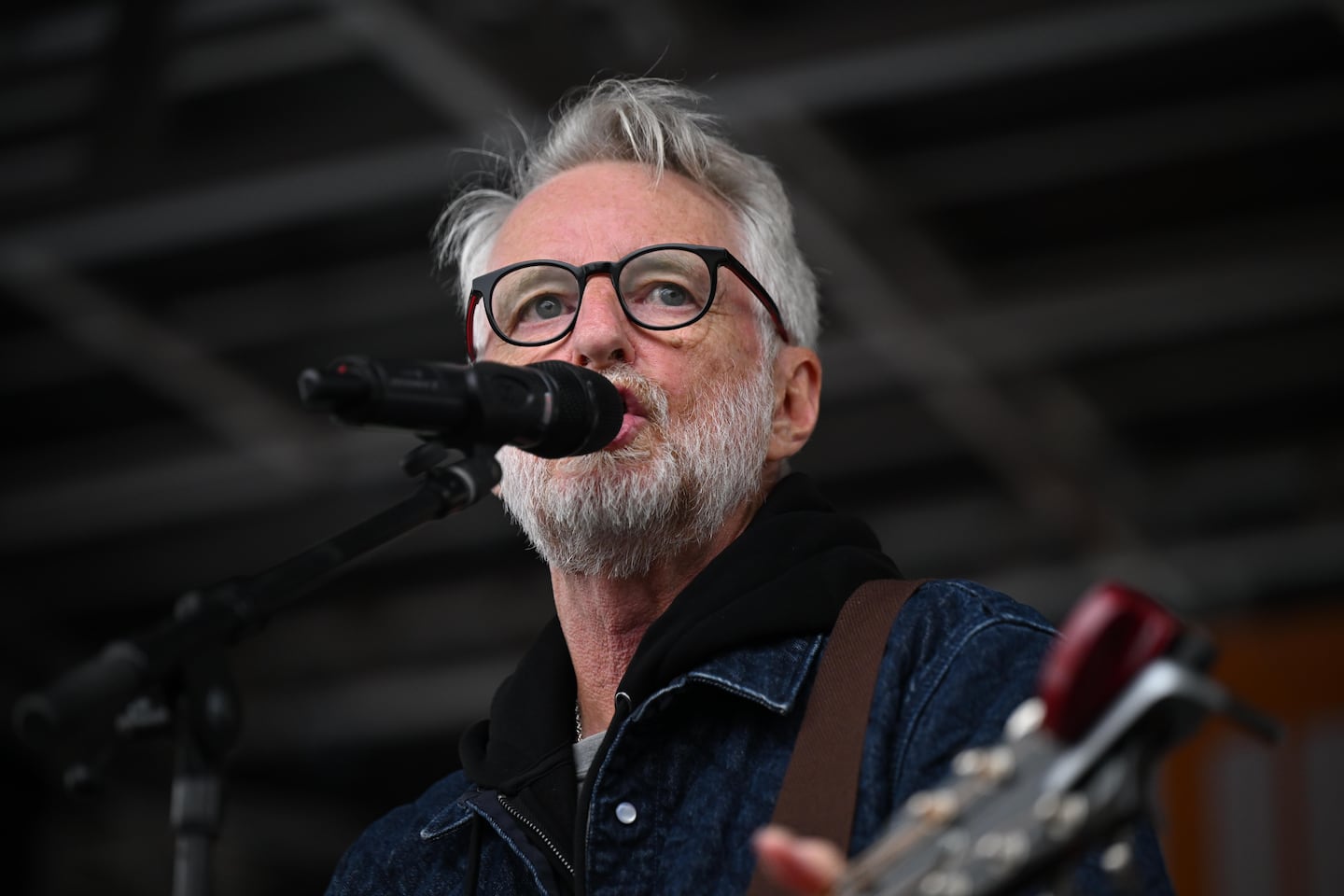 Billy Bragg performs from the stage in Parliament Square during a protest against the State Visit of President Trump on Sept. 17, 2025, in London.