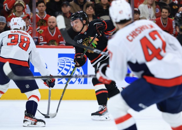 Blackhawks center Connor Bedard (98) takes a shot on goal in the first period against the Capitals at the United Center on Jan. 9, 2026, in Chicago. (John J. Kim/Chicago Tribune)