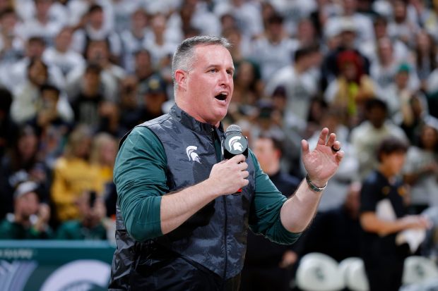 Michigan State football coach Pat Fitzgerald addresses the crowd during the first half of a basketball game against Iowa on Dec. 2, 2025, in East Lansing, Mich. (Al Goldis/AP)