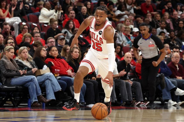 Bulls forward/guard Isaac Okoro (35) brings the ball up court against the Pelicans in the first half at the United Center on Wednesday, Dec. 31, 2025. (Terrence Antonio James/Chicago Tribune)