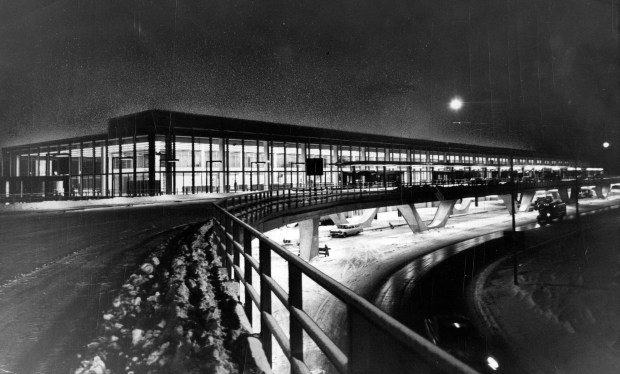 Night view of one of the two new passenger terminals at Chicago's O'Hare International Airport, which have just opened with completion of the field. This is the terminal for United, Continental, Northwest and Trans Canada airlines. The lower level is for handling of baggage. (Metro News Photos)