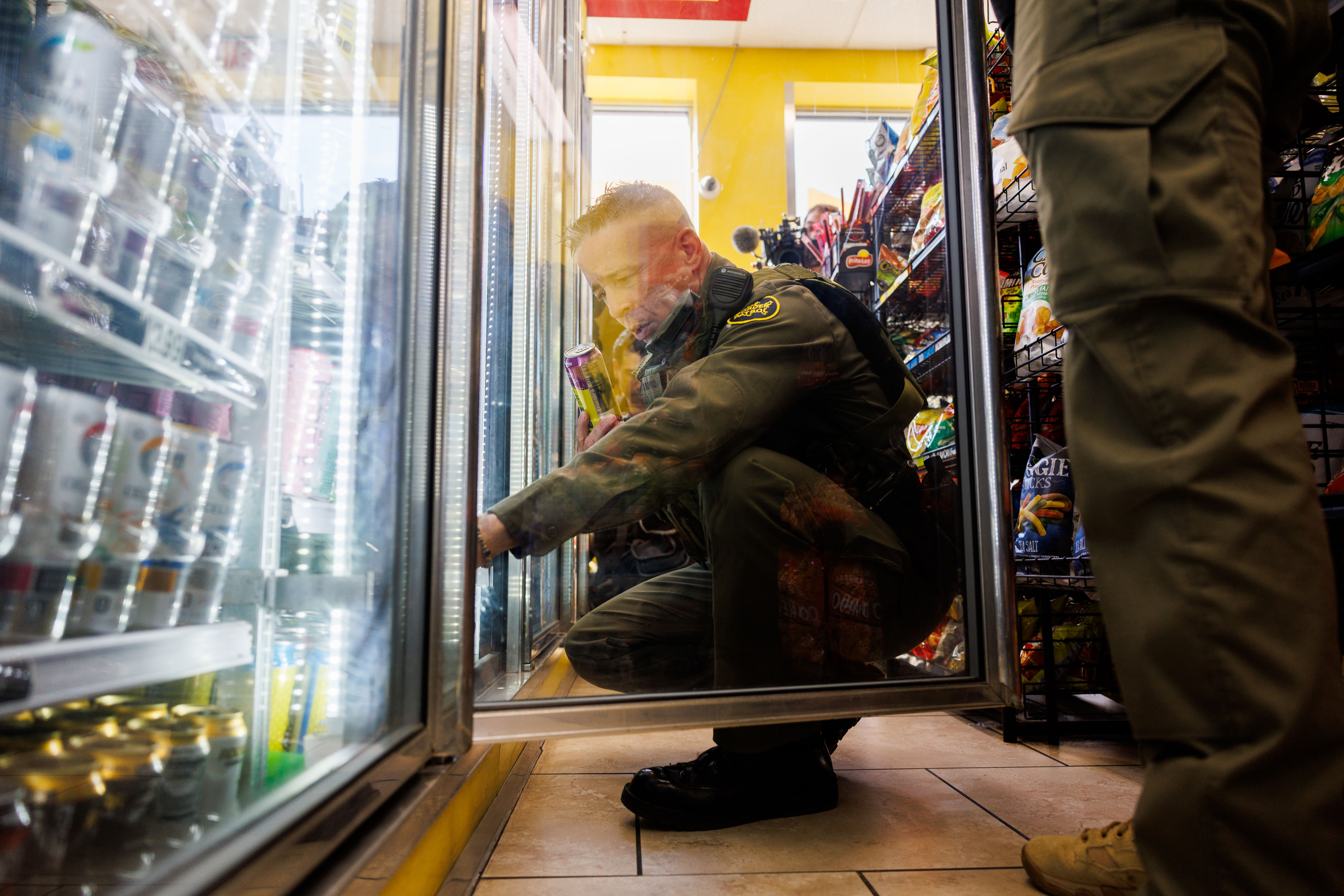 Border Patrol Cmdr. Gregory Bovino buys drinks at a Skokie...
