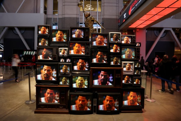 Old televisions stacked in the United Center atrium show images of Derrick Rose prior to his #1 jersey being retired by the Chicago Bulls in a ceremony scheduled for after a game between the Bulls and the Boston Celtics on Jan. 24, 2026. (Chris Sweda/Chicago Tribune)