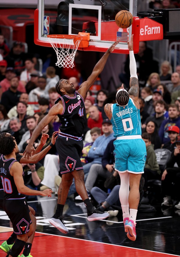 Chicago Bulls forward Patrick Williams (44) tries to block the layup attempt of Charlotte Hornets forward Miles Bridges (0) in the first half of a game at the United Center in Chicago on Jan. 3, 2026. (Chris Sweda/Chicago Tribune)