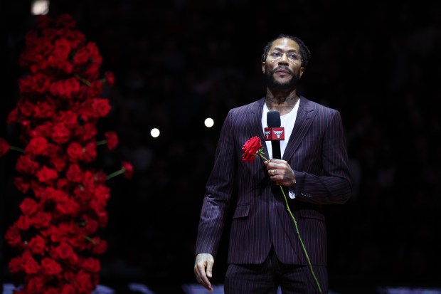 Former Chicago Bulls player Derrick Rose speaks while being honored at halftime of a game between the Bulls and the New York Knicks at the United Center in Chicago on Jan. 4, 2025. (Chris Sweda/Chicago Tribune)