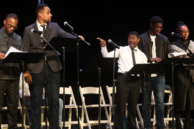 Dr. Martin Luther King is played by Edwin Edvanzd, center, who speaks during a staged reading of "Lawndale King" by Collaboraction Theatre Company at the Chicago History Museum on Jan. 19, 2026. (Antonio Perez/Chicago Tribune)