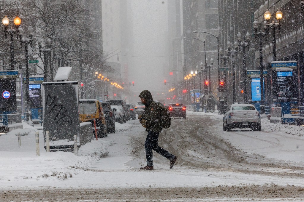 Slick roads in store as more snow sweeps across the Chicago area