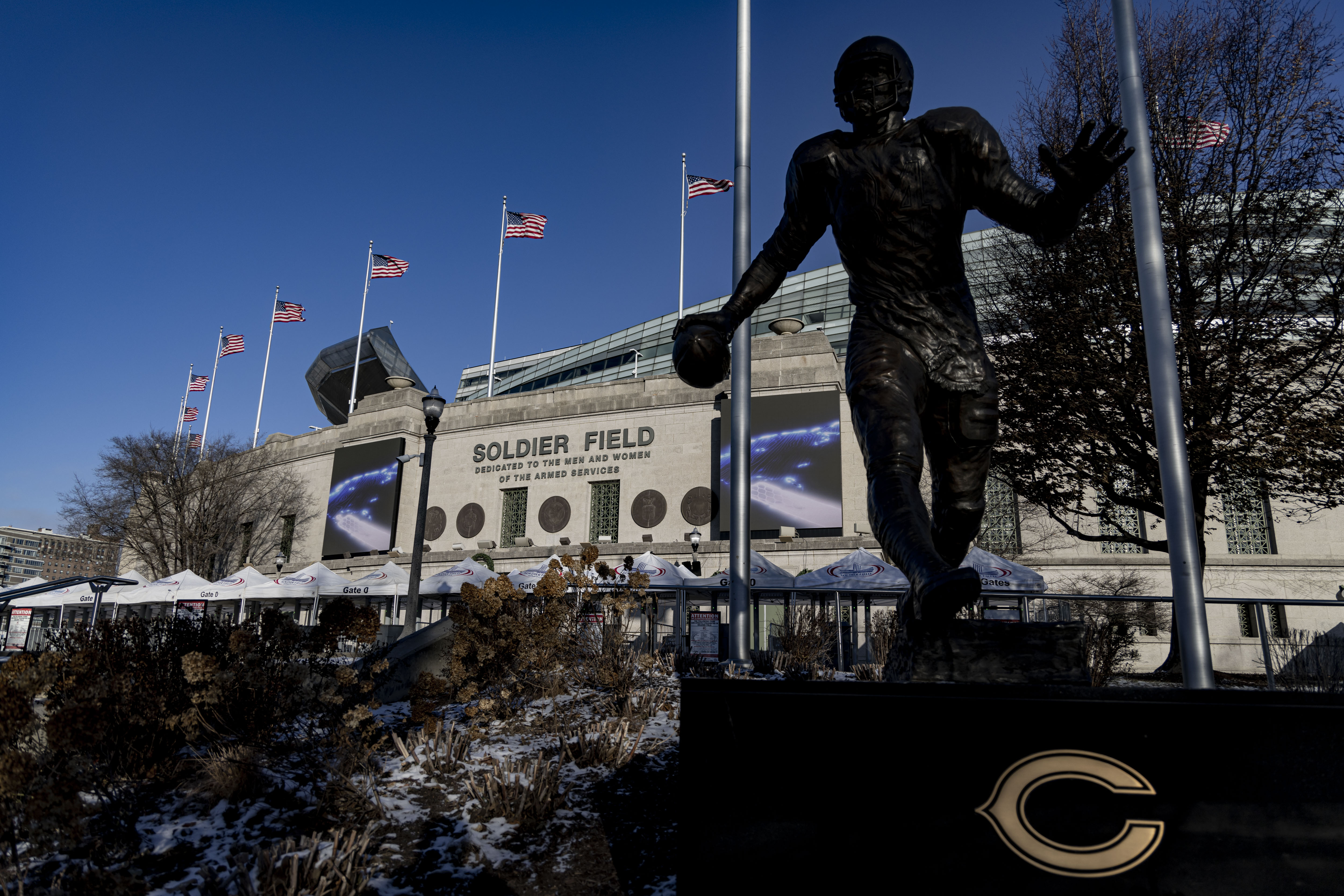 Soldier Field and the Walter Payton statue on Dec. 18,...