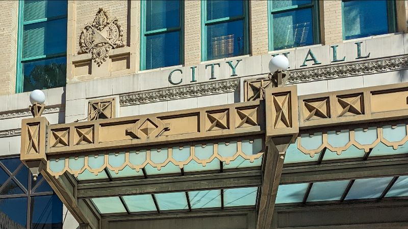 Security guards at Jacksonville City Hall were directed to write down the names of people who brought guns inside the building.