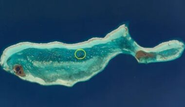A photo taken from space shows a whale-shaped island in Belize and highlights the Great Blue Hole, one of the deepest marine sinkholes on the planet.