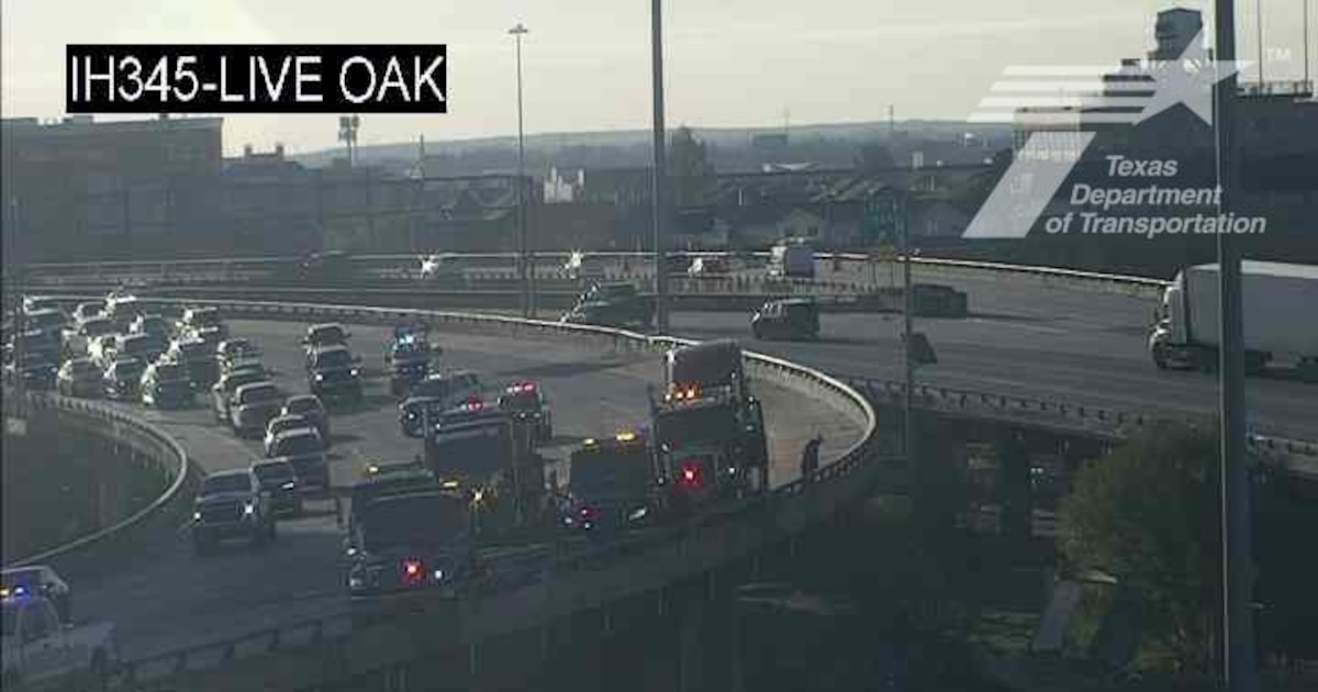 Crash near Downtown Dallas sends 18-wheeler driver to hospital, spills honey buns on I-30