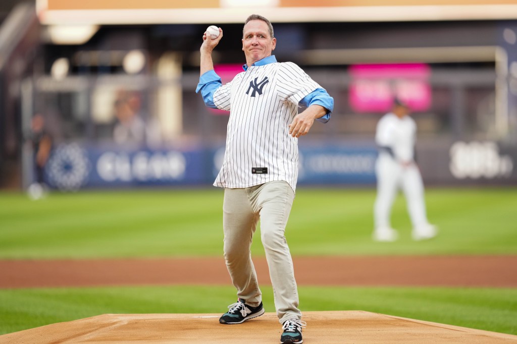 David Cone throws the ceremonial first pitch prior to the game between the New York Mets and the New York Yankees at Yankee Stadium on Tuesday, July 23, 2024 in New York, New York. 