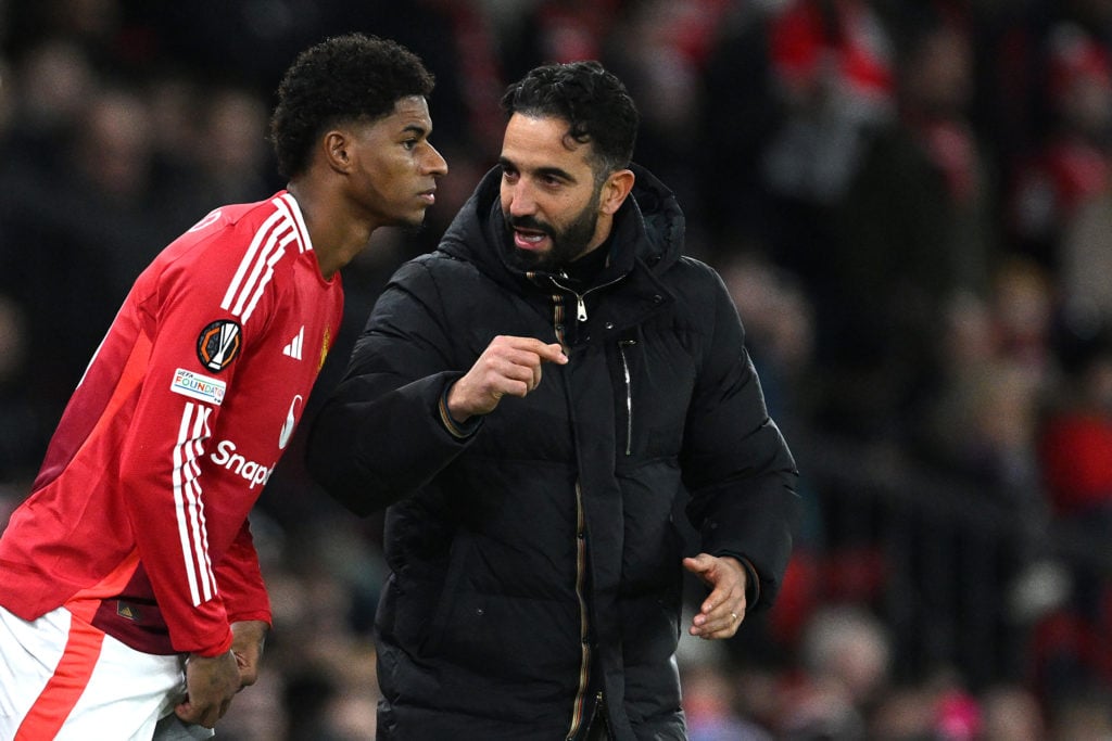 Manchester United head coach Ruben Amorim giving instructions to Marcus Rashford.