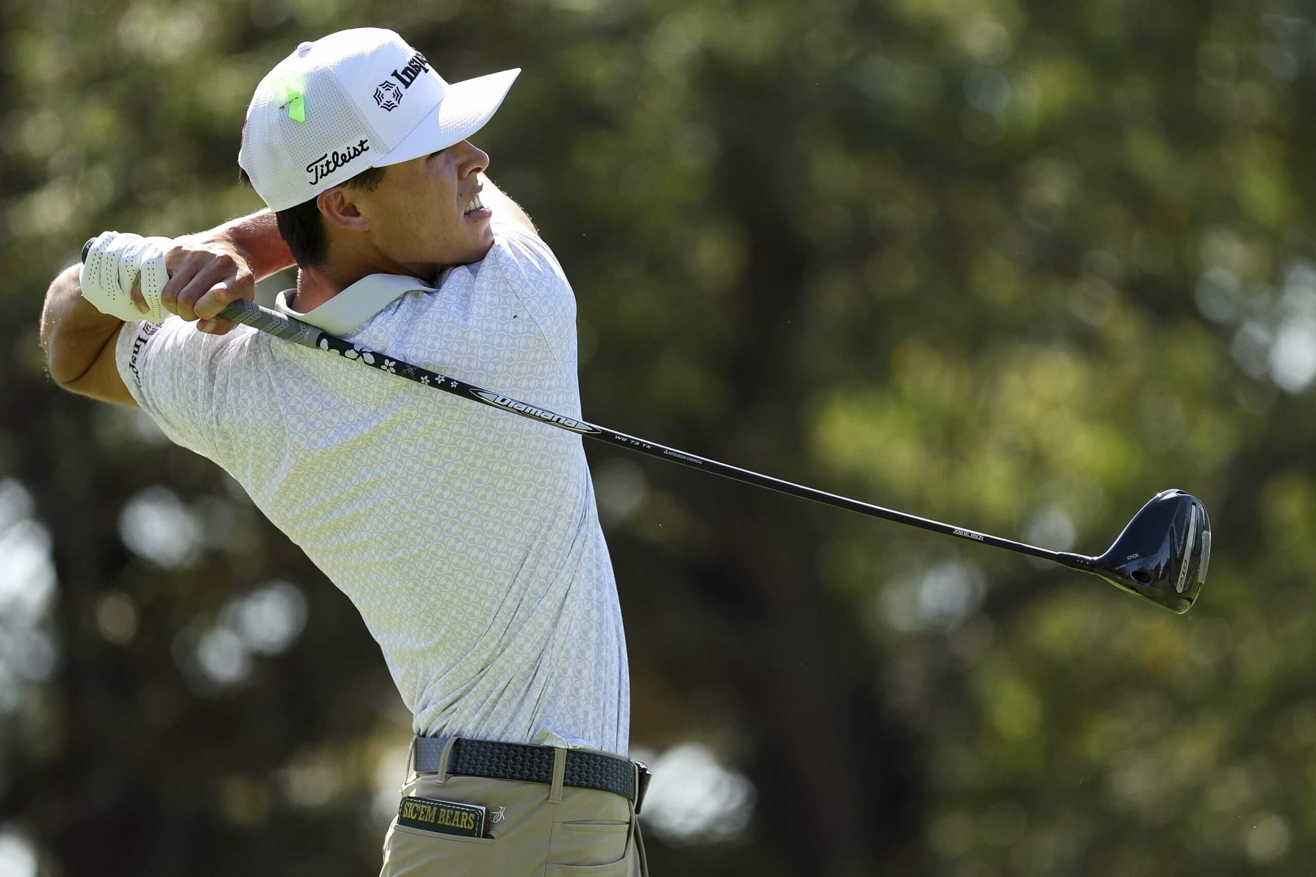 Johnny Keefer swings a golf club.