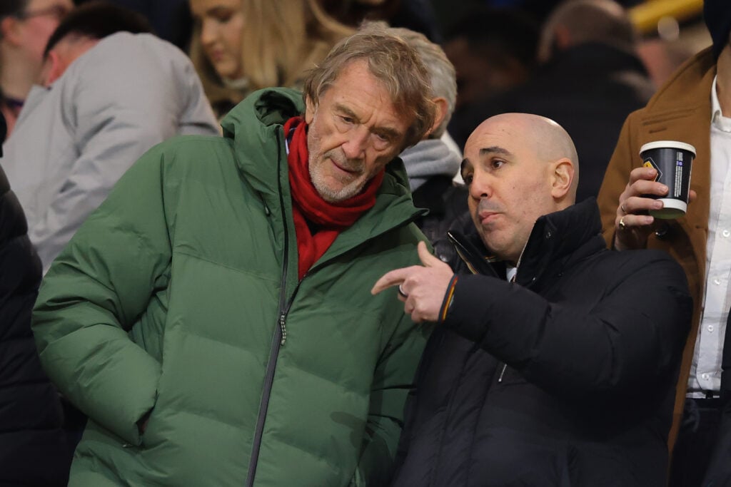 Sir Jim Ratcliffe, co-owner of Manchester United, speaks with Omar Berrada, chief-executive officer of Manchester United, during the Premier League match between Wolverhampton Wanderers and Manchester United at Molineux on December 08, 2025 in Wolverhampton, England