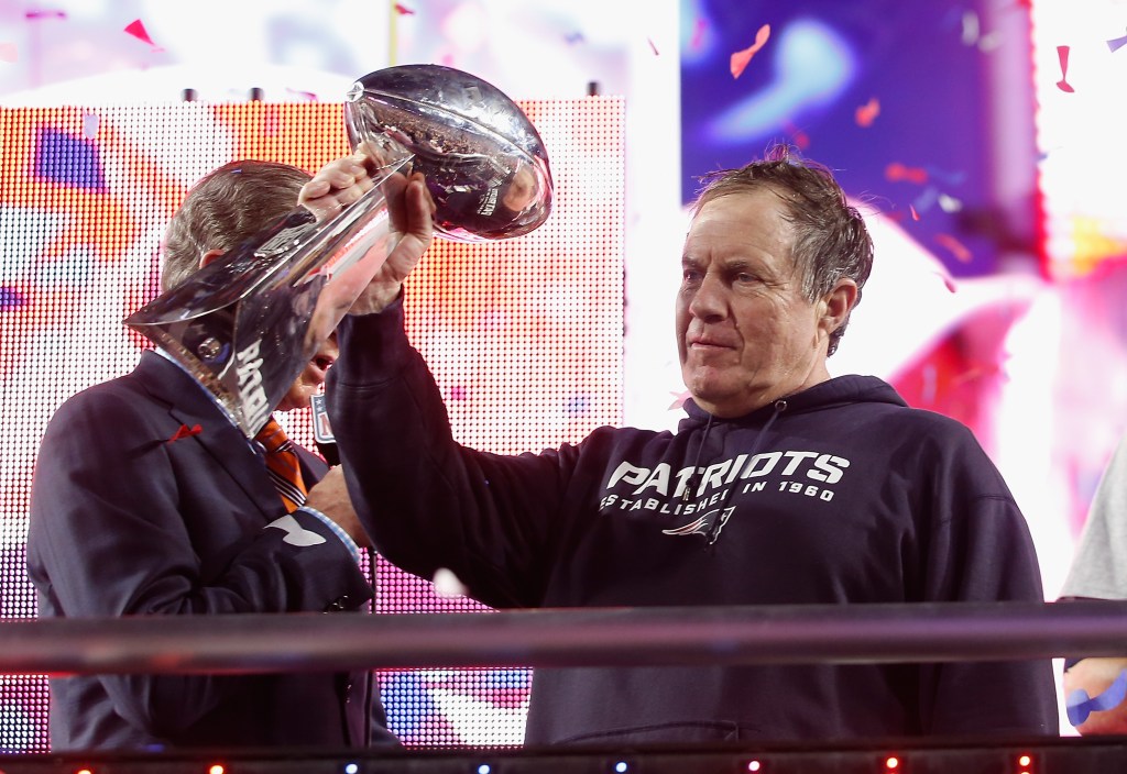 Head coach Bill Belichick of the New England Patriots celebrates with the Vince Lombardi Trophy after defeating the Seattle Seahawks 28-24 to win Super Bowl XLIX at University of Phoenix Stadium on February 1, 2015 in Glendale, Arizona. 