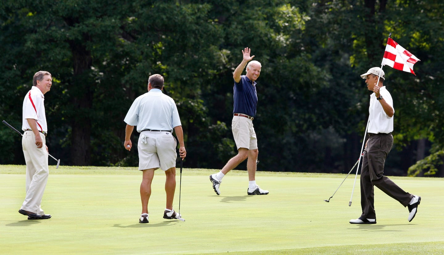 Then-president Barack Obama, from right, then-vice President Joe Biden, House Speaker John Boehner, R-Ohio, and Ohio Governor John Kasich walk on the first green during a round of golf at Andrews Air Force Base, Md., June 18, 2011.