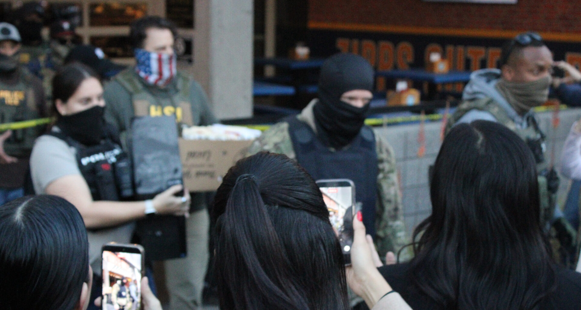 protesters film ice agents