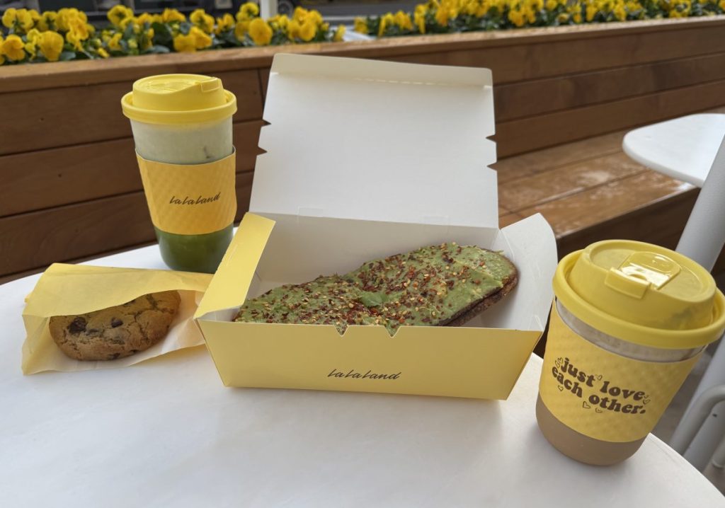 A table to-go cups and boxes.