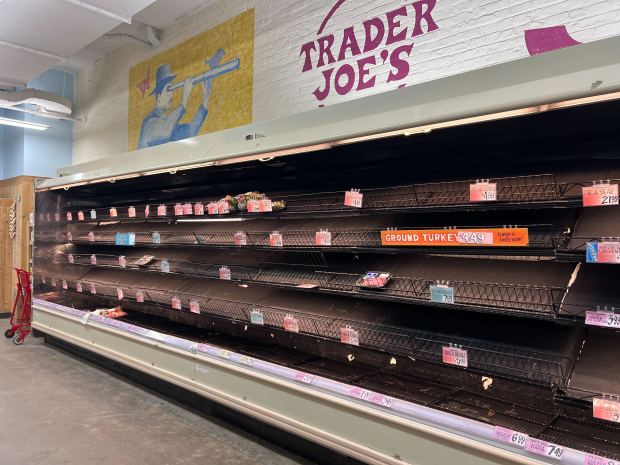 Empty shelves are pictured at a Trader Joe's on Spring St. near Varick St. in Manhattan on Saturday, Jan. 24, 2026. (Emma Seiwell / New York Daily News)