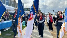 Sabrina Nguyen (center) is one of the leaders of the Vietnamese Eucharistic Movement. The local chapter is a group of younger generation Catholics who walked, Saturday, January 24, 2026.