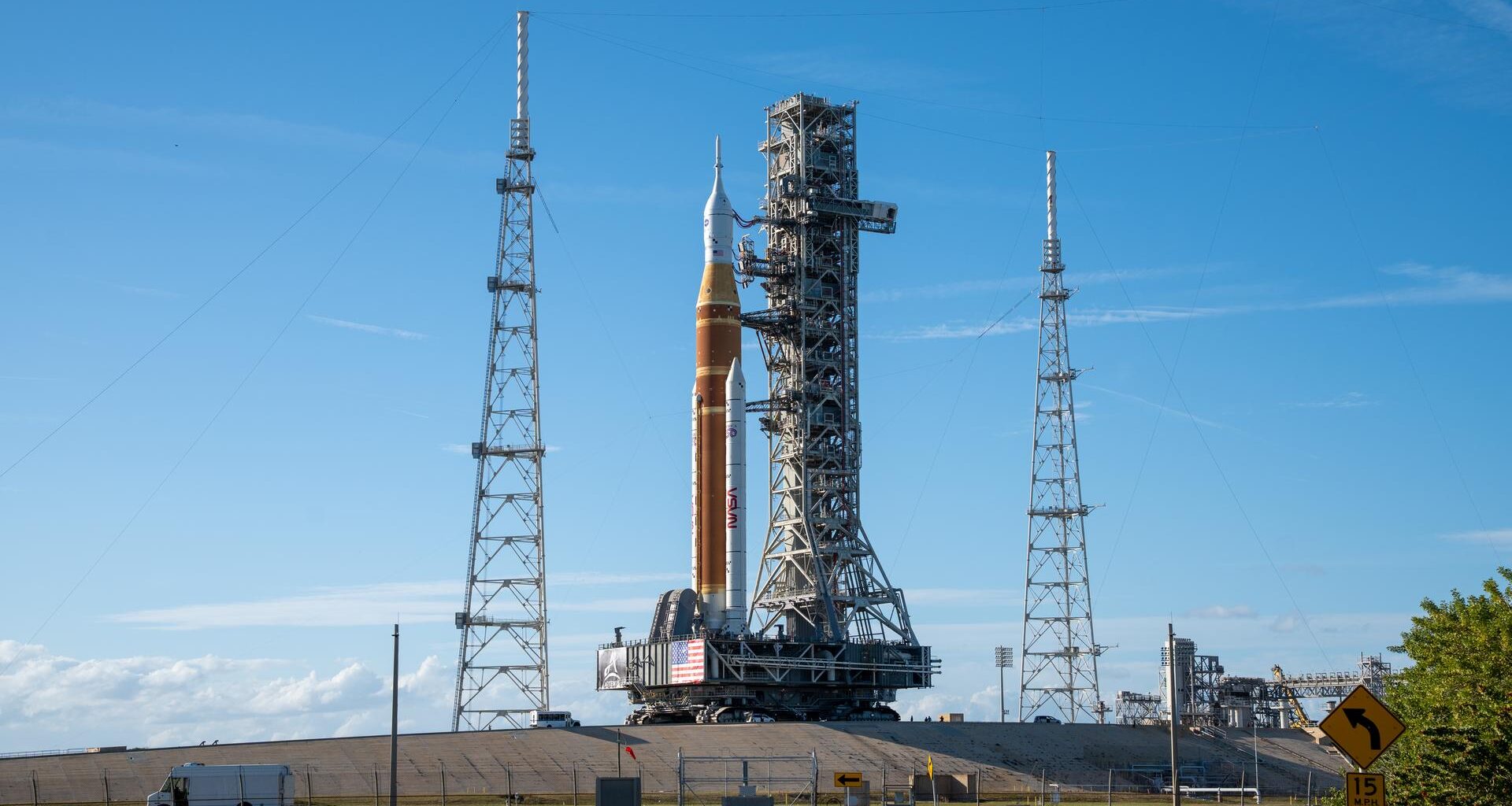 This image shows NASA’s SLS (Space Launch System) and Orion spacecraft rolling out of the Vehicle Assembly Building at NASA’s Kennedy Space Center. NASA's massive Crawler-Transporter, upgraded for the Artemis program, carries the powerful SLS rocket and Orion spacecraft on the Mobile Launcher from the Vehicle Assembly Building to Launch Pad 39B at Kennedy Space Center in preparation for the Artemis II mission.