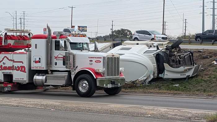 Driver hospitalized after 18-wheeler flips over on Loop 410, San Antonio police say