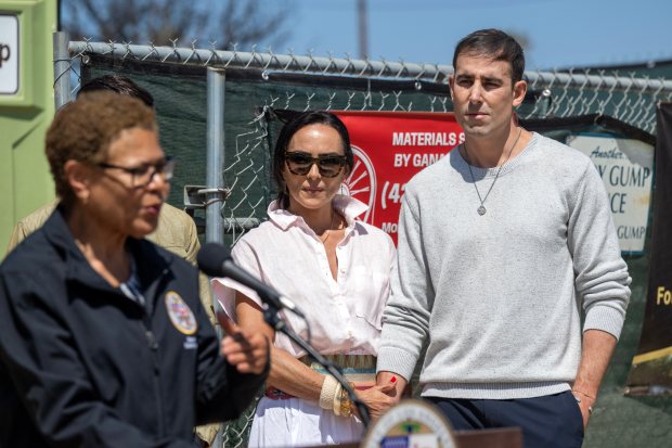 Mayor Karen Bass speaks as homeowners Walter and Alessandra Lopes look on during a press conference outside a home that was destroyed during the Palisades Fire and is now being rebuilt in Pacific Palisades on Monday, May 19, 2025. (Photo by Hans Gutknecht, Los Angeles Daily News/SCNG)