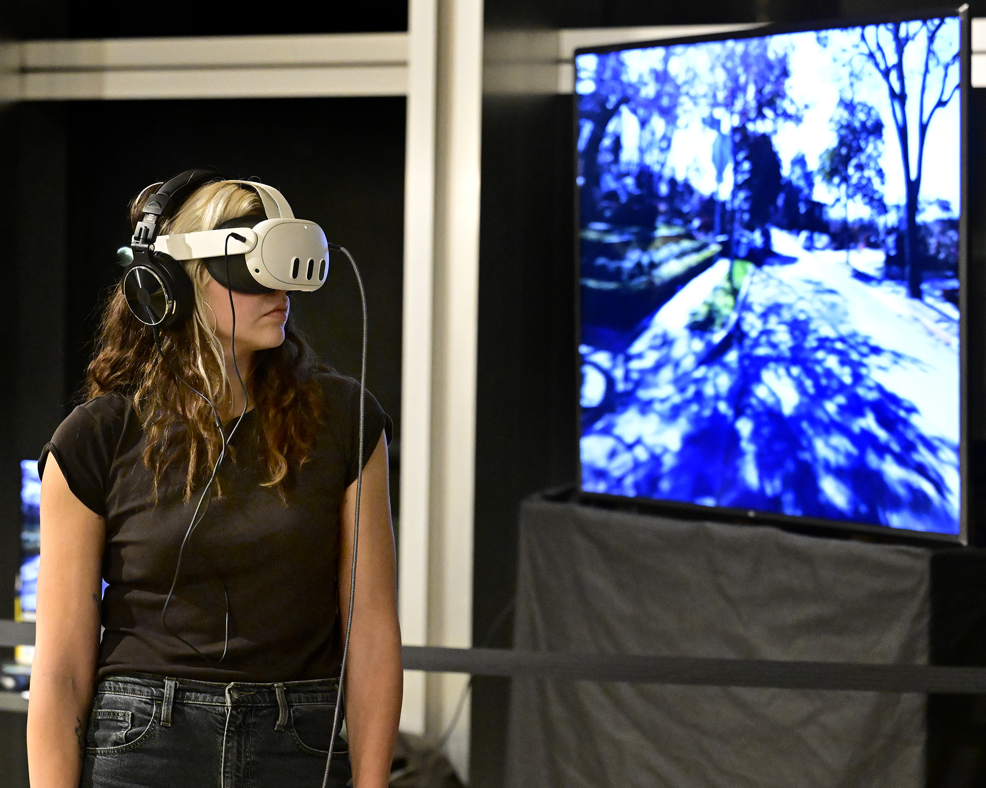 Esen K Tutuncu uses VR glasses to look at a...