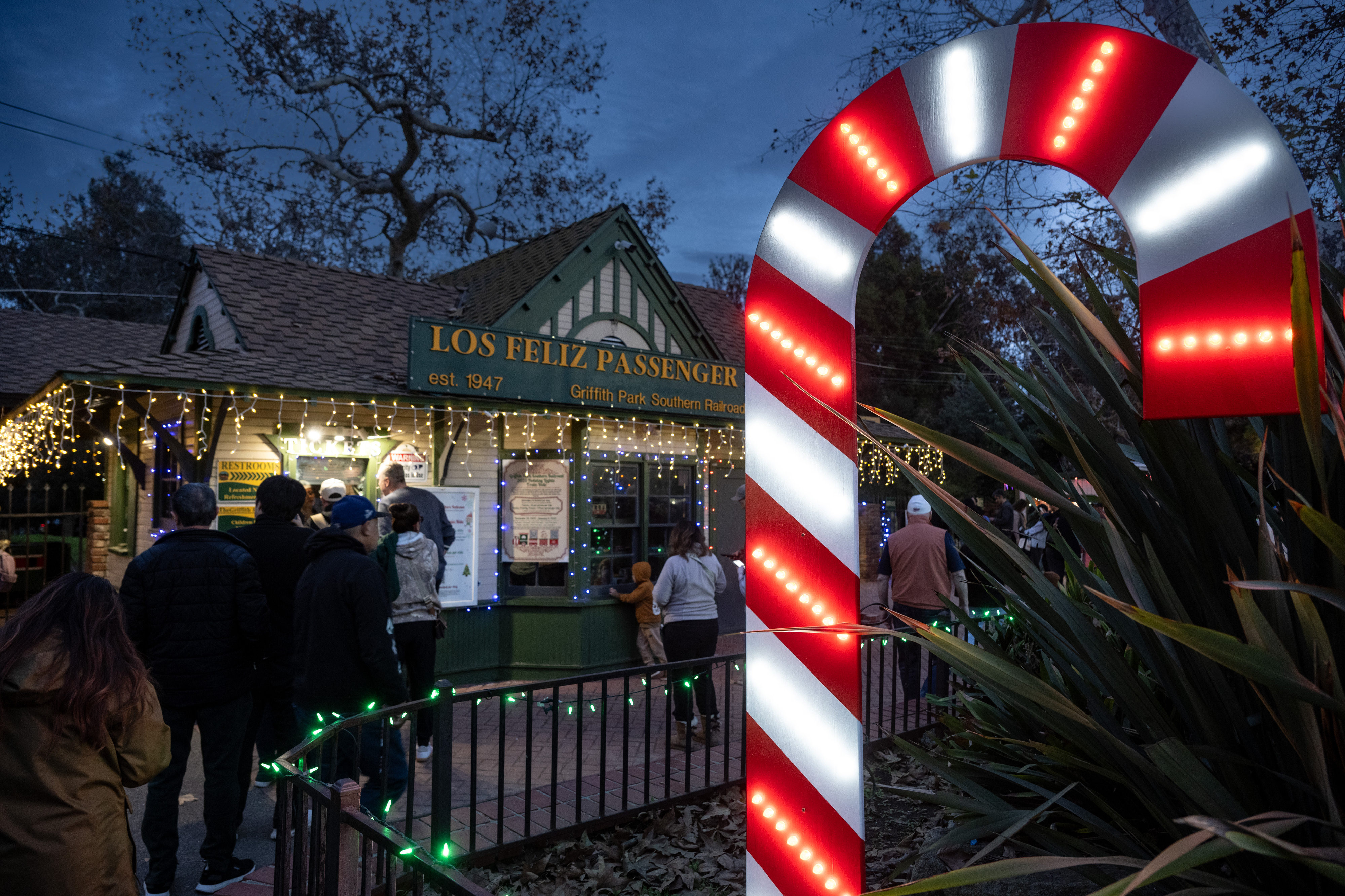 Passengers line for for tickets to the tour of holiday...