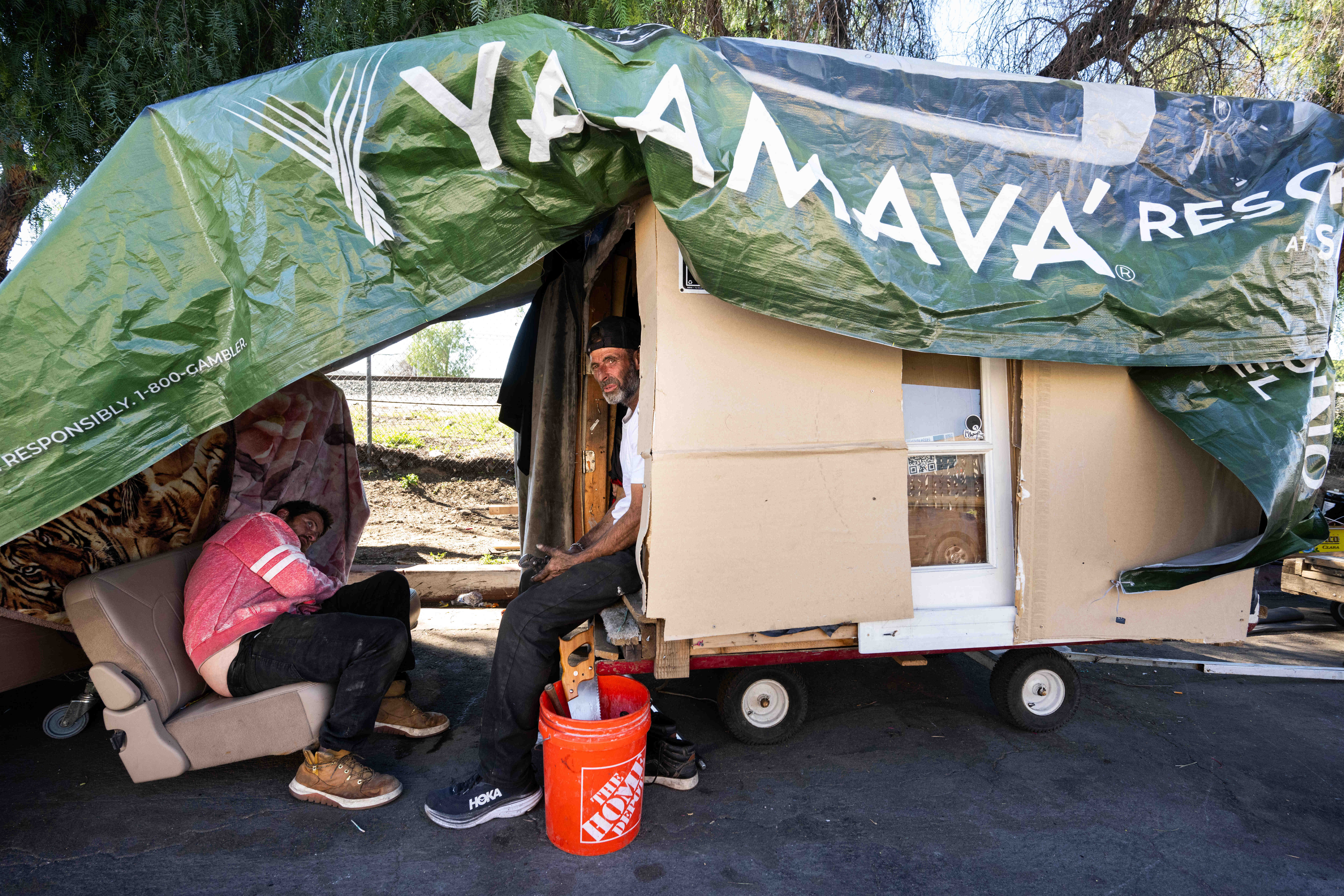 Jeff Few, 42, visits Joseph Cirincione, 47, at his trailer...