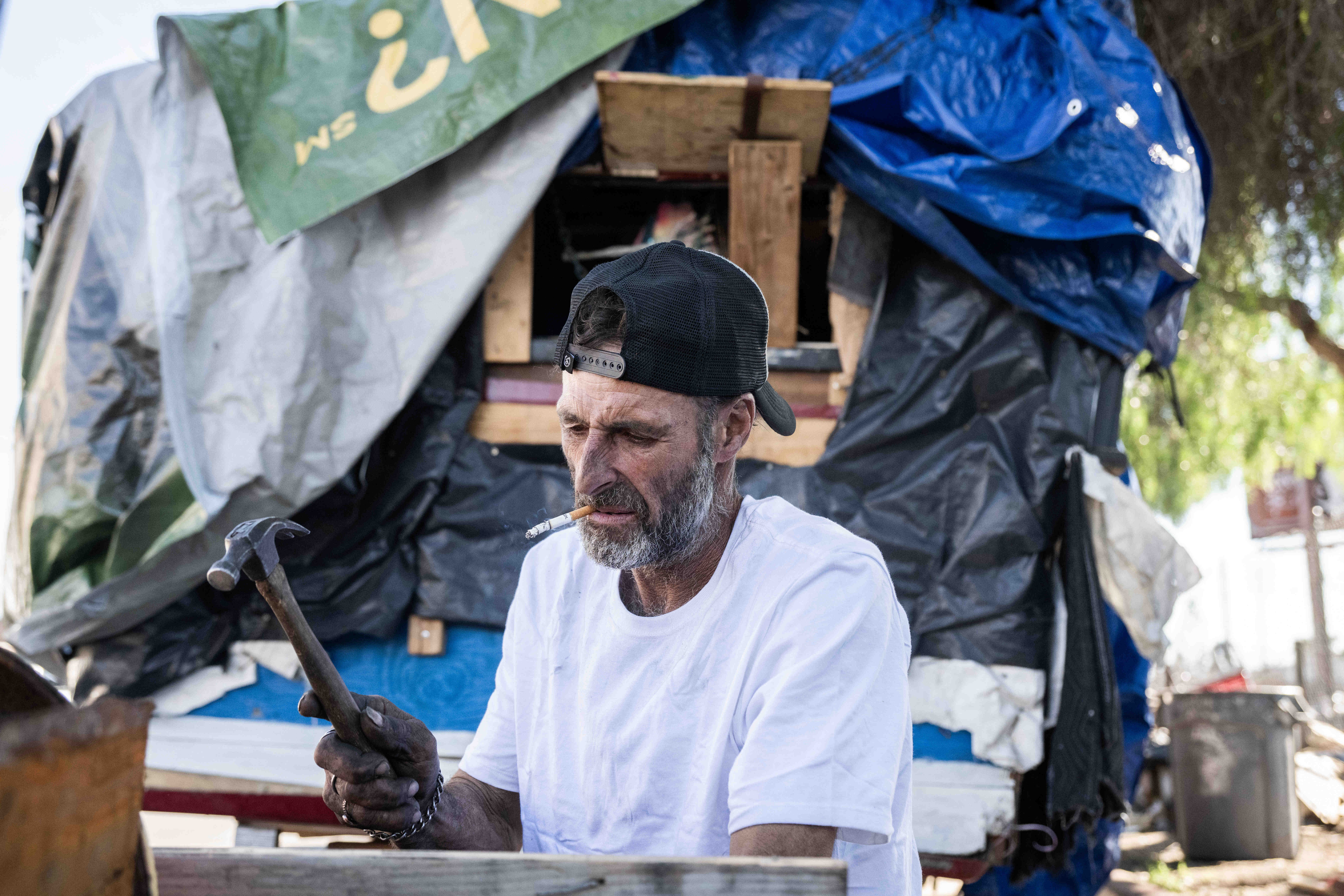 Joseph Cirincione, 47, builds a metal recycling trailer at his...