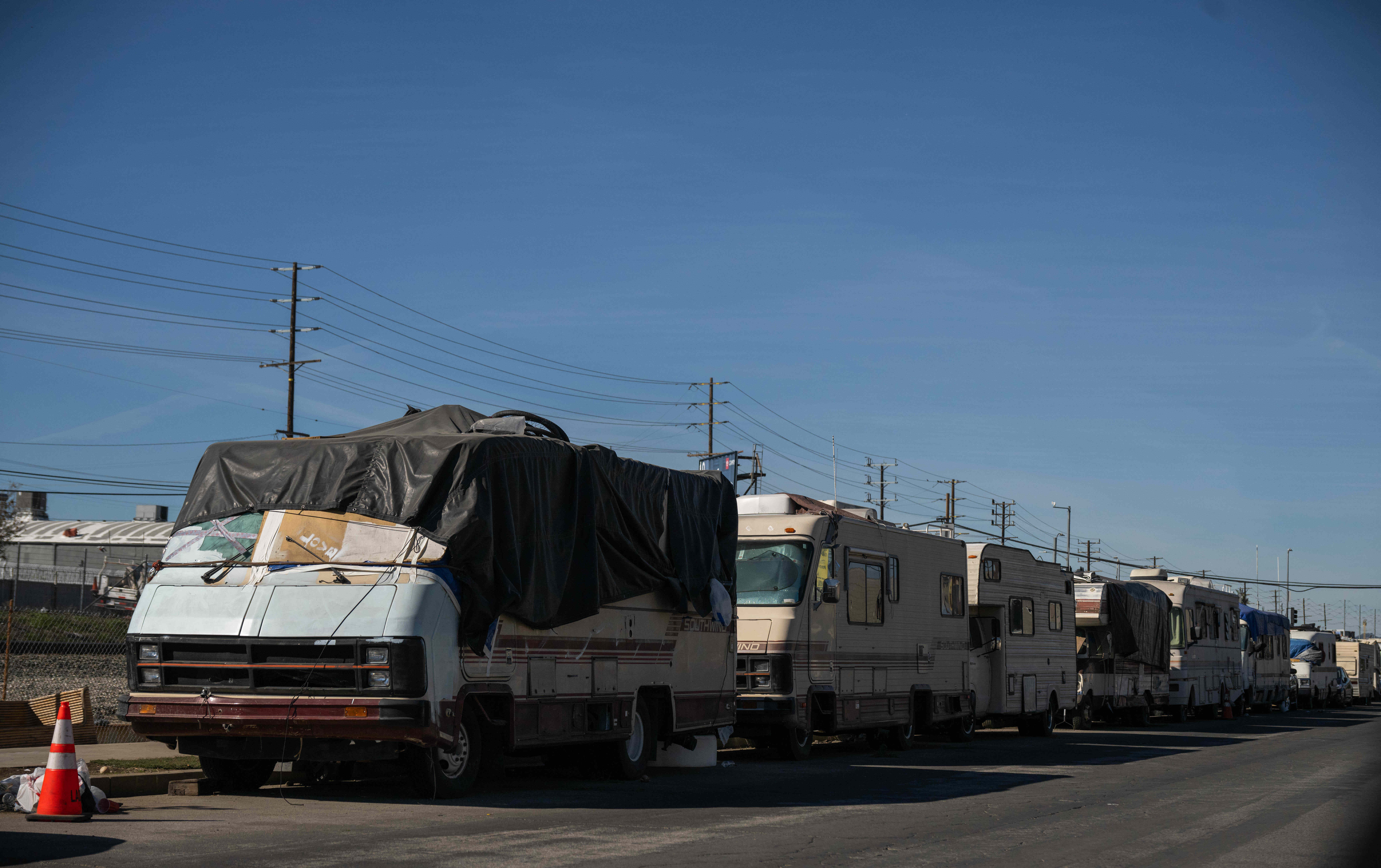RV and trailer homes are parked along San Fernando Road...