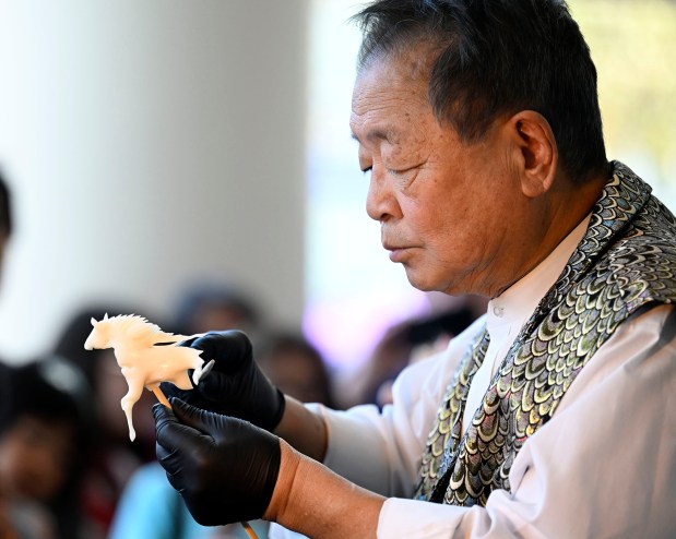 Candy maker Shinobu Ichiyanagi, aka Shan the Candy Man, crafts a horse out of candy. The Oshogatsu Festival ushered in the new year at the Japanese American National Museum on Jan. 5, 2025 in Los Angeles CA. (Photo by John McCoy, Contributing Photographer)