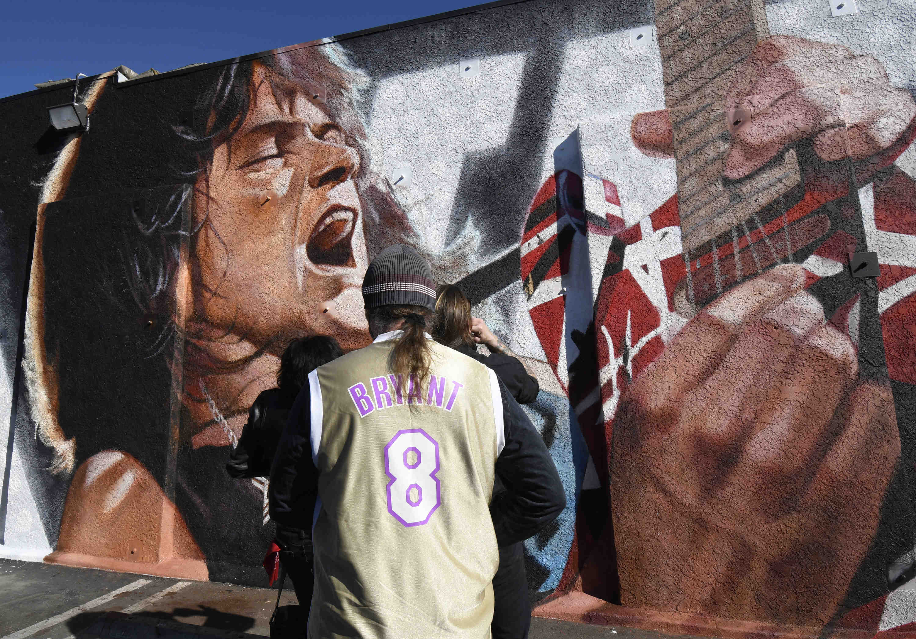 Eddie Van Halen fans come out in full rock-n-roll gear...