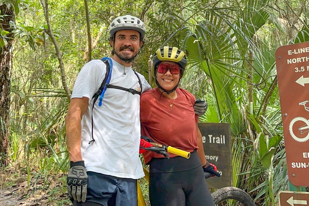Antonio and Nicole enjoy mountain biking.