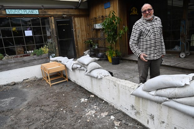 Mauro Dosolini stands beside sandbags at one of his properties on Gate 5 Road in Sausalito, Calif., on Wednesday, Jan. 21, 2026. (Alan Dep/Marin Independent Journal)