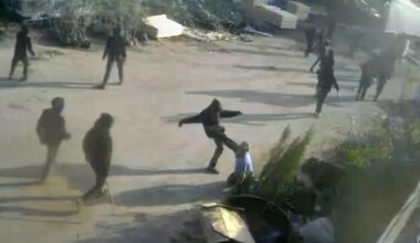 Video shows armed men beating a Palestinian in the Israeli-occupied West Bank