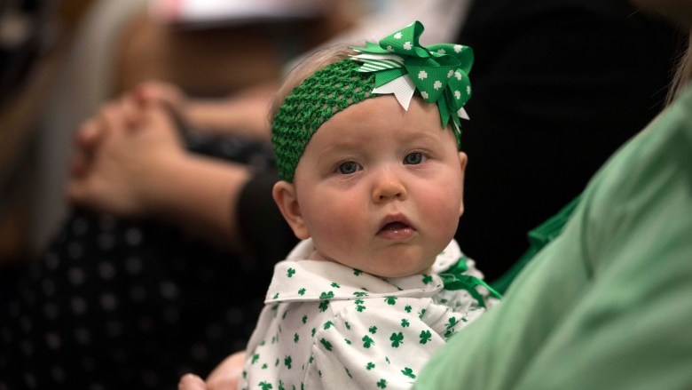 An Irish family dressed their baby in shamrock clothing.