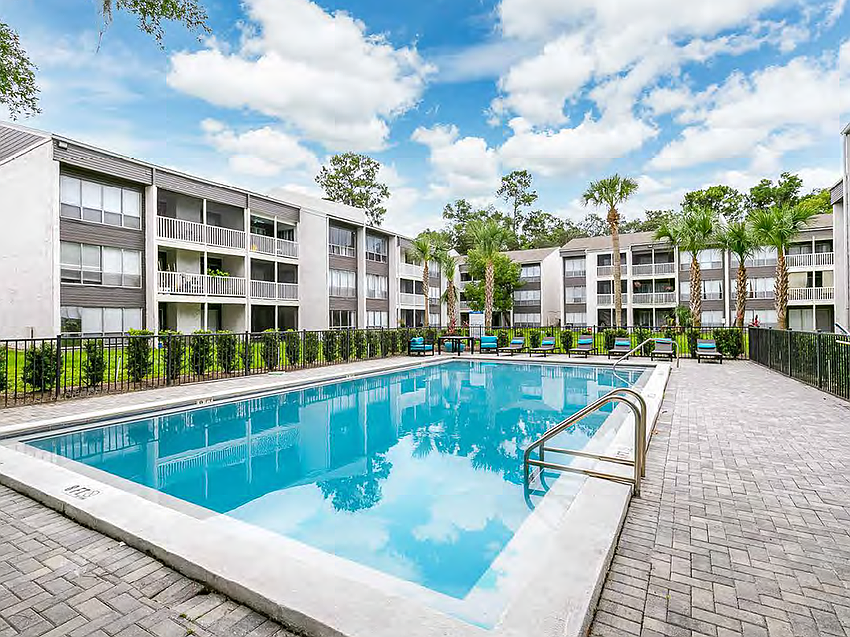 Amenities at Pier 5350 apartments include pools, a waterfront clubhouse, fitness center, grills and a private fishing dock.